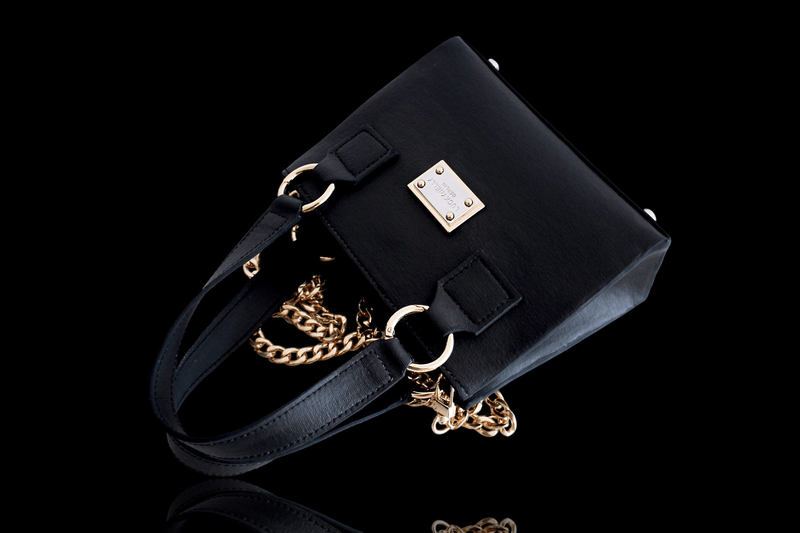 Rheom Materials and New Climate Ventures Raise $1805 for Texas Flood Relief with Auction of LUCKYNELLY’s Black Orchid Bag
